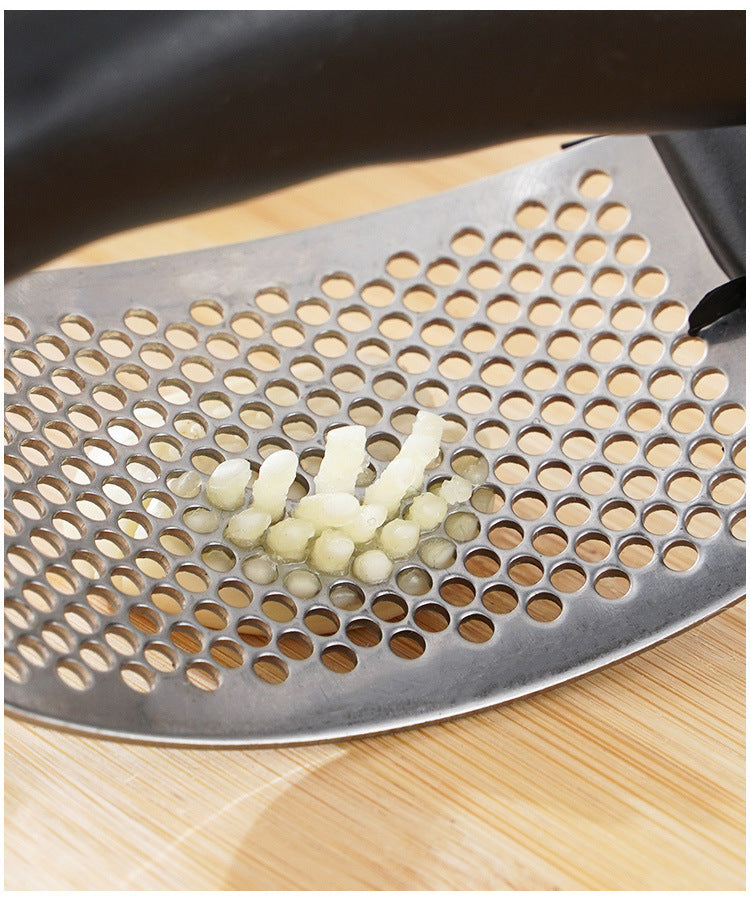 KitchenHelp™ Trituradora de ajos ergonómica